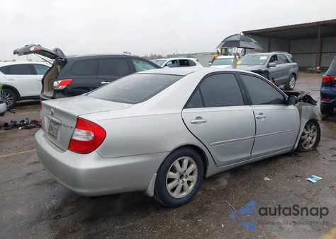 2003 Toyota Camry Xle z USA, uszkodzony, nr VIN 4T1BE32K73U714064